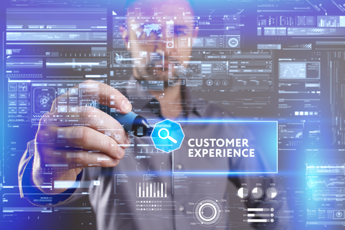Business, Technology, Internet and network concept. Young businessman working on a virtual screen of the future and sees the inscription: Customer experience